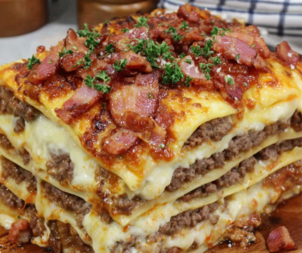 A stack of meat and cheese.