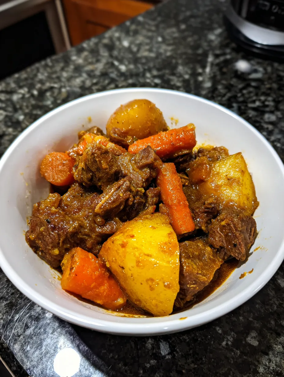 A bowl of meat and vegetables.