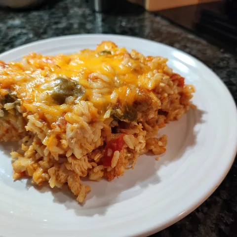 A white plate with a piece of food on it.