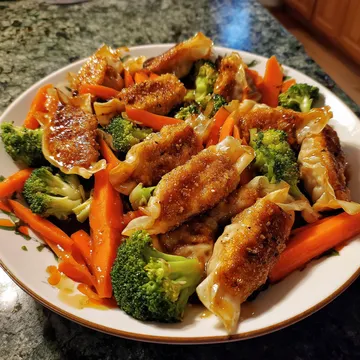 A plate of food with broccoli and carrots.